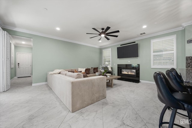28537 Vista Del Rio Dr, Valencia, CA 91354 - living room with a glass covered fireplace, a ceiling fan, light marble finish flooring, recessed lighting, and ornamental molding