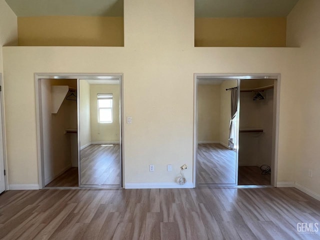 7412 Indian Gulch St, Bakersfield, CA 93313 - unfurnished bedroom featuring wood finished floors and a closet