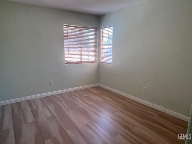 7412 Indian Gulch St, Bakersfield, CA 93313 - unfurnished room with light wood-style flooring and baseboards