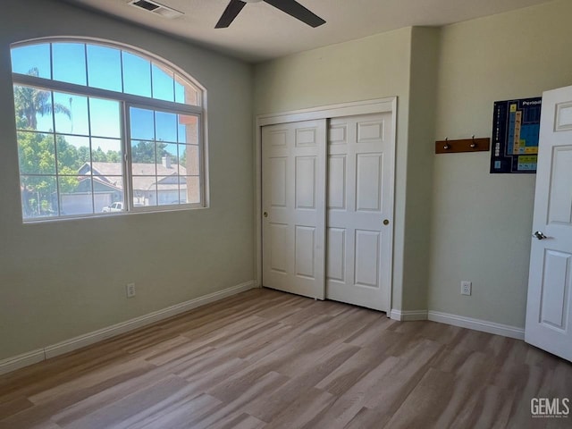 7412 Indian Gulch St, Bakersfield, CA 93313 - unfurnished bedroom featuring light wood finished floors, a closet, and a ceiling fan