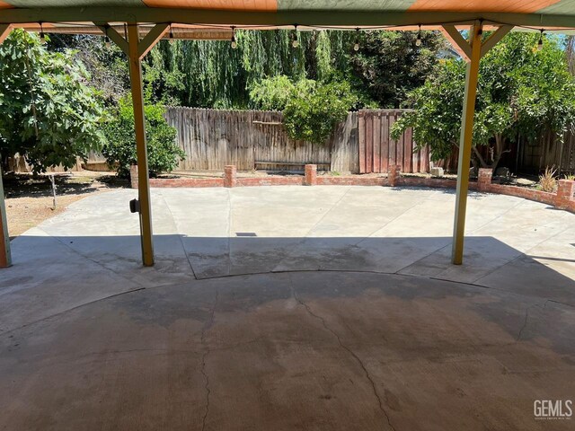 7412 Indian Gulch St, Bakersfield, CA 93313 - fenced backyard featuring a patio