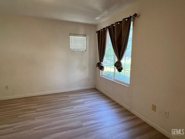 7412 Indian Gulch St, Bakersfield, CA 93313 - unfurnished room with light wood-type flooring and baseboards