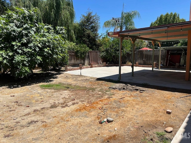 7412 Indian Gulch St, Bakersfield, CA 93313 - fenced backyard featuring a patio