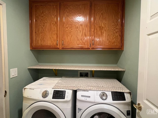 7412 Indian Gulch St, Bakersfield, CA 93313 - laundry room featuring washer and clothes dryer and cabinet space