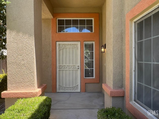 7412 Indian Gulch St, Bakersfield, CA 93313 - view of exterior entry with stucco siding