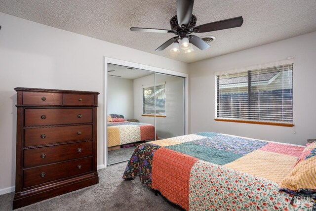 9604 Lea Oak Rd, Bakersfield, CA 93311 - carpeted bedroom with multiple windows, a closet, a textured ceiling, and a ceiling fan