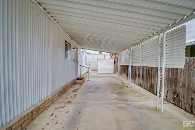 400 E Roberts Ln Unit 48, Bakersfield, CA 93308 - view of patio / terrace with an attached carport and fence
