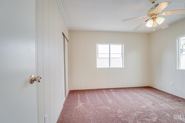400 E Roberts Ln Unit 48, Bakersfield, CA 93308 - unfurnished bedroom featuring carpet floors, a ceiling fan, and a closet