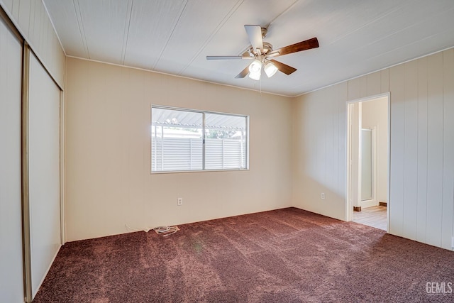 400 E Roberts Ln Unit 48, Bakersfield, CA 93308 - unfurnished bedroom featuring carpet, ceiling fan, and a closet