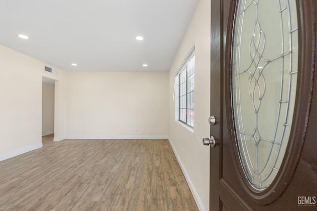 foyer featuring wood-type flooring