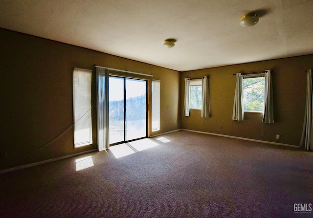 25231 Paramount Dr, Tehachapi, CA 93561 - carpeted empty room featuring baseboards