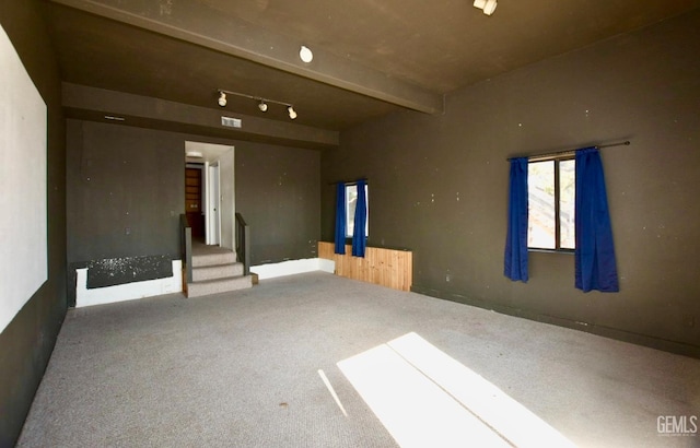 25231 Paramount Dr, Tehachapi, CA 93561 - unfurnished room featuring carpet flooring, stairway, and beamed ceiling