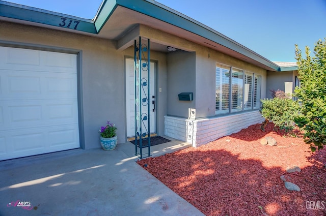 property entrance featuring a garage