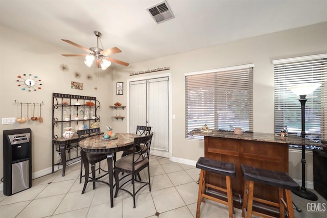 4400 Cron Way, Bakersfield, CA 93311 - dining room with ceiling fan, baseboards, light tile patterned floors, and lofted ceiling