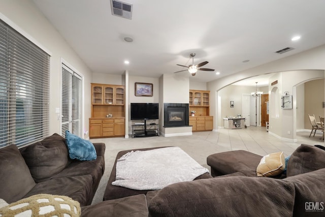 4400 Cron Way, Bakersfield, CA 93311 - living area featuring arched walkways, ceiling fan, baseboards, a chandelier, and recessed lighting