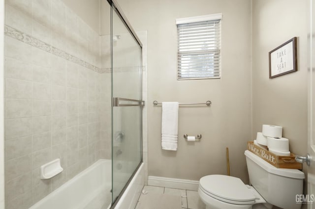 4400 Cron Way, Bakersfield, CA 93311 - bathroom featuring toilet, bath / shower combo with glass door, baseboards, and tile patterned flooring