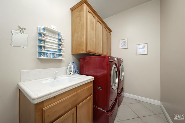 4400 Cron Way, Bakersfield, CA 93311 - washroom featuring independent washer and dryer, cabinet space, light tile patterned floors, and baseboards
