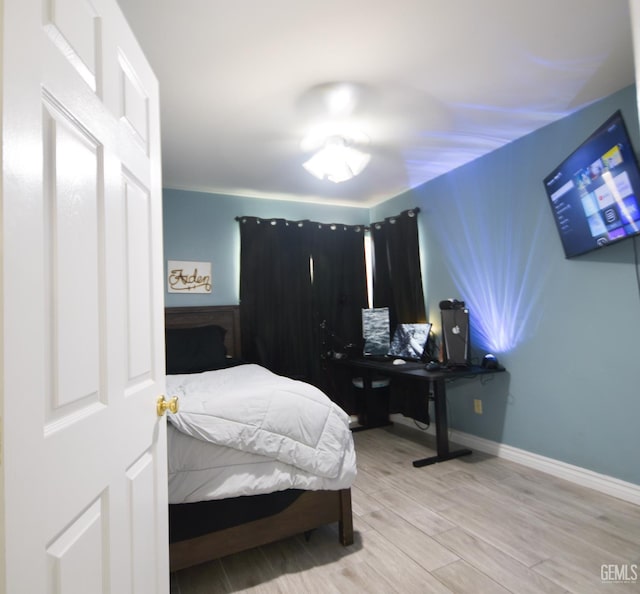 11712 Novara Ave, Bakersfield, CA 93312 - bedroom with wood finished floors and baseboards