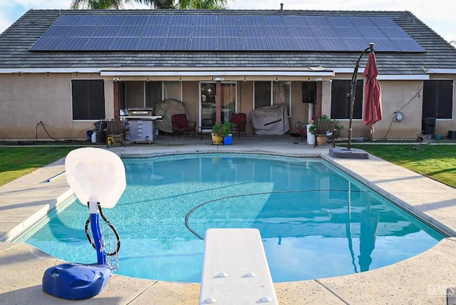 11712 Novara Ave, Bakersfield, CA 93312 - swimming pool featuring a diving board, a patio, and area for grilling