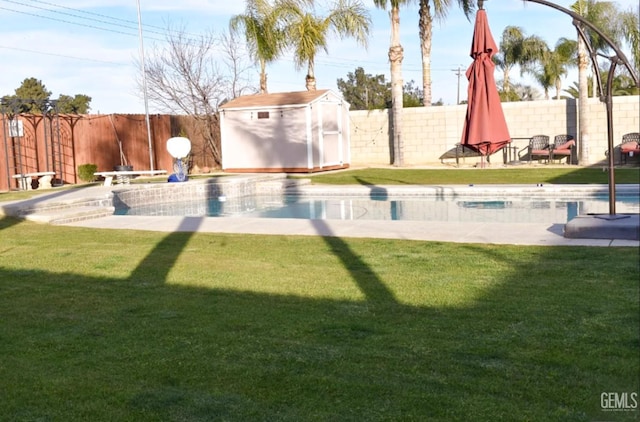 11712 Novara Ave, Bakersfield, CA 93312 - view of yard featuring a storage unit and an outbuilding