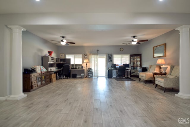 11712 Novara Ave, Bakersfield, CA 93312 - living room with decorative columns, a ceiling fan, an office area, and wood finished floors