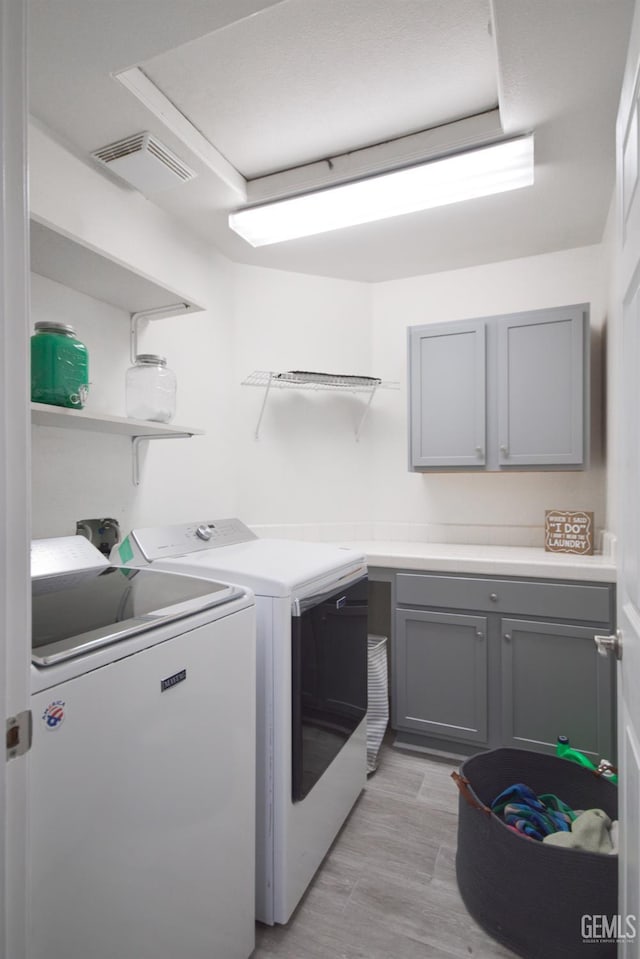 11712 Novara Ave, Bakersfield, CA 93312 - laundry area with washer and dryer and cabinet space