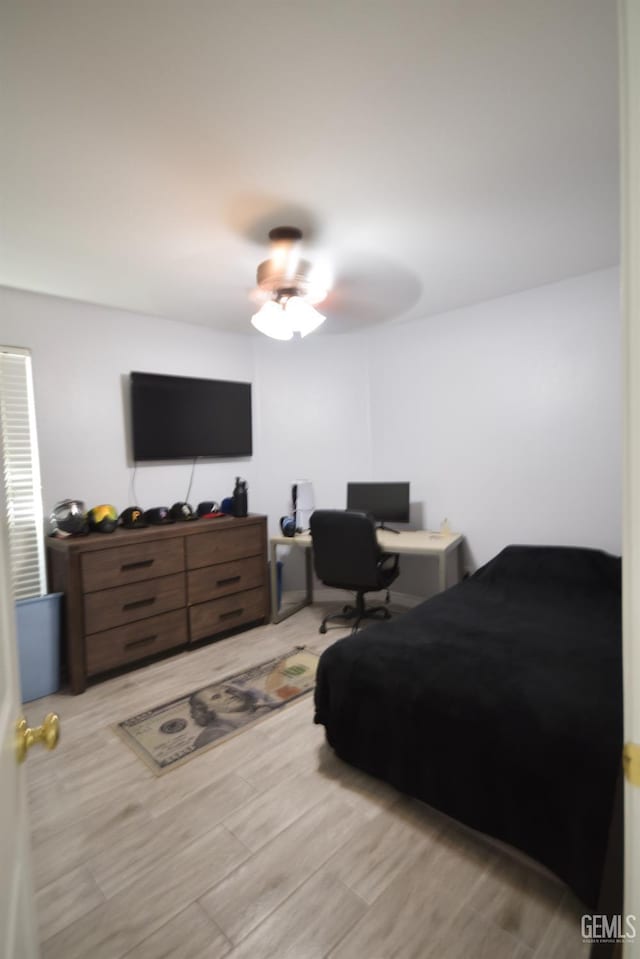 11712 Novara Ave, Bakersfield, CA 93312 - bedroom with a desk, a ceiling fan, and wood finished floors