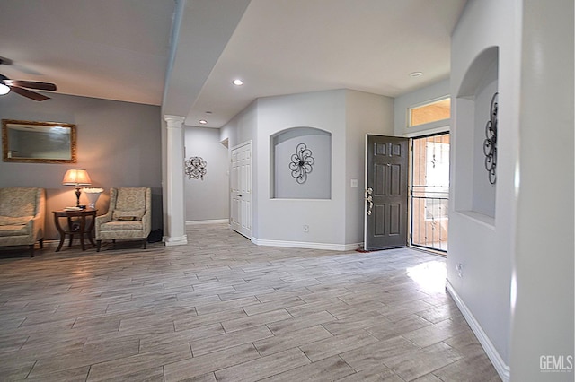 11712 Novara Ave, Bakersfield, CA 93312 - entryway featuring baseboards, wood finished floors, ceiling fan, recessed lighting, and decorative columns
