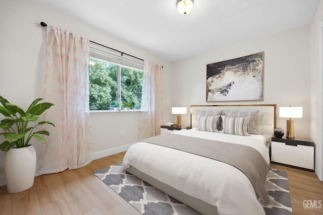 bedroom featuring light hardwood / wood-style floors