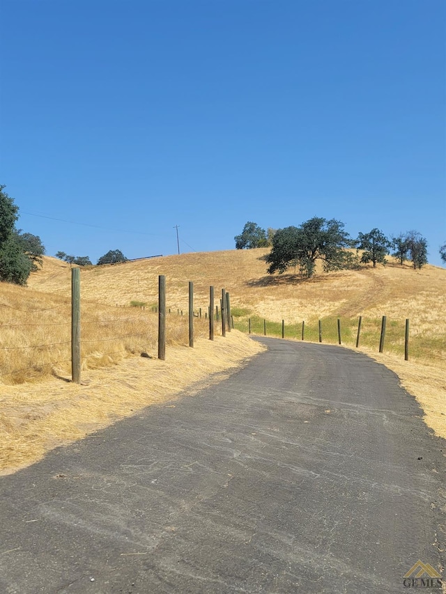 view of road featuring a rural view