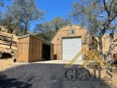 view of outdoor structure featuring a garage