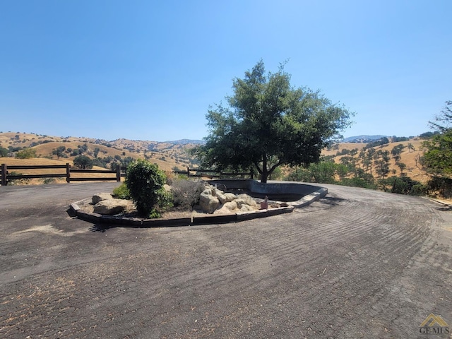 view of road with a mountain view and a rural view