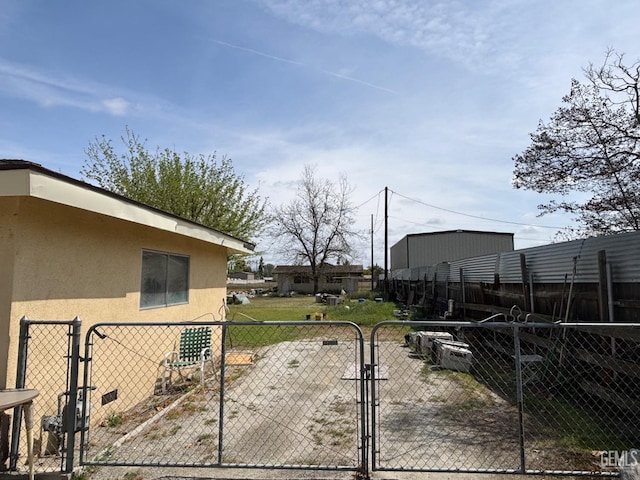 2710 Maher Way, Bakersfield, CA 93312 - view of yard with a gate