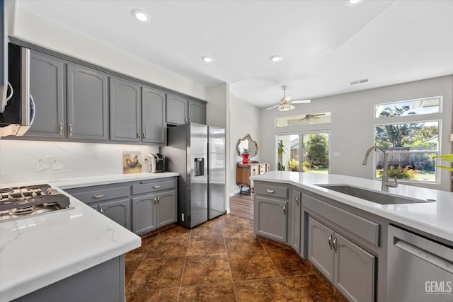 4504 Polo Club Dr, Bakersfield, CA 93312 - kitchen featuring stainless steel appliances, gray cabinetry, ceiling fan, and recessed lighting