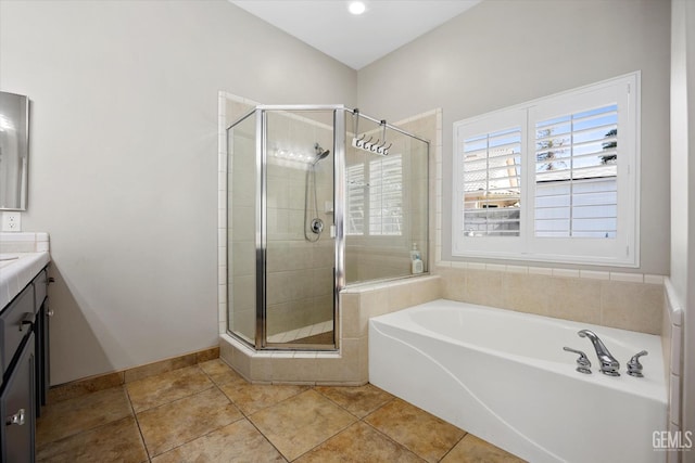 4504 Polo Club Dr, Bakersfield, CA 93312 - bathroom with vanity, a garden tub, a stall shower, and tile patterned floors