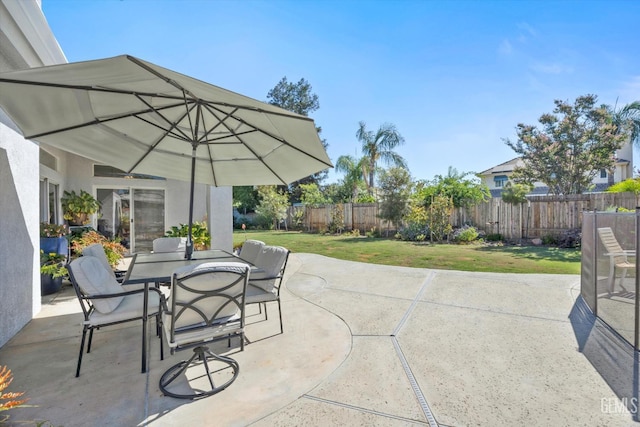 4504 Polo Club Dr, Bakersfield, CA 93312 - fenced backyard with outdoor dining area and a patio area