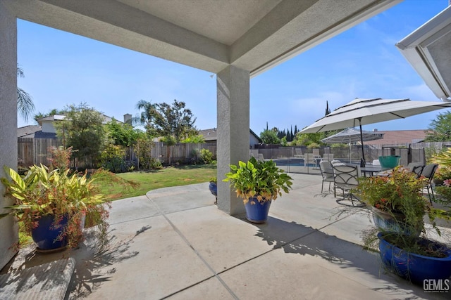 4504 Polo Club Dr, Bakersfield, CA 93312 - fenced backyard featuring a patio and a community pool