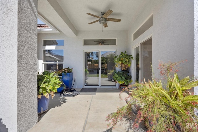 4504 Polo Club Dr, Bakersfield, CA 93312 - doorway to property featuring ceiling fan, a patio area, and stucco siding