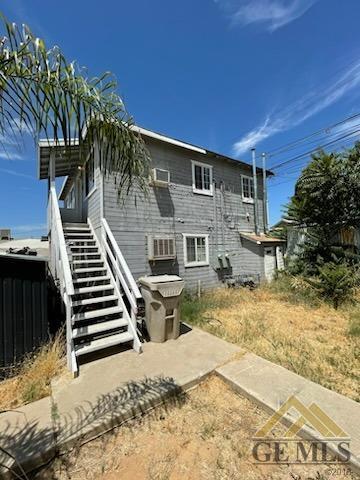 324 Lincoln Ave, Bakersfield, CA 93308 - back of house featuring stairs