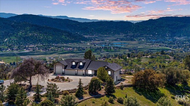detached garage with a mountain view