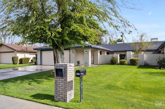 ranch-style home with driveway, an attached garage, fence, a front lawn, and stucco siding