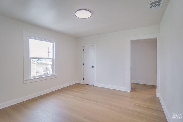 710 Fillmore St, Taft, CA 93268 - unfurnished room with baseboards, light wood-style flooring, and visible vents