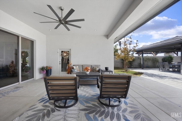 view of patio / terrace with outdoor lounge area and ceiling fan