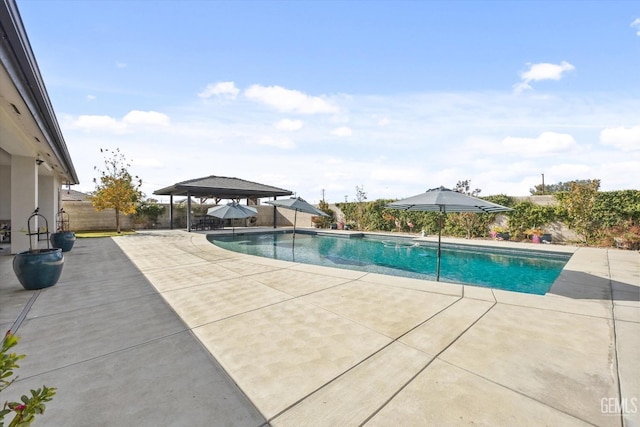 view of pool featuring a gazebo and a patio area