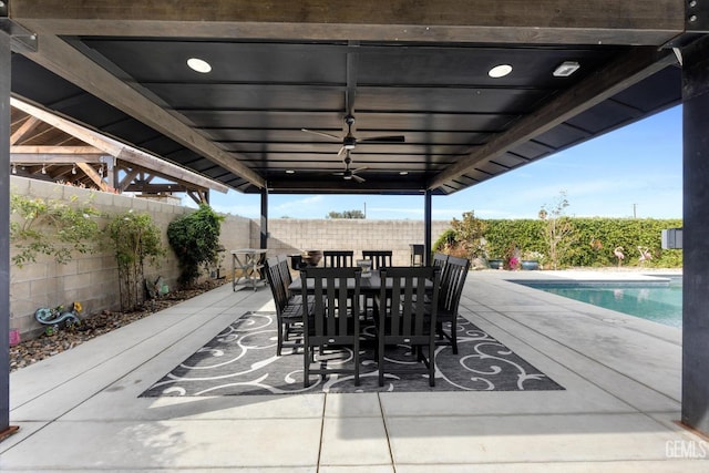 view of patio / terrace featuring a fenced in pool