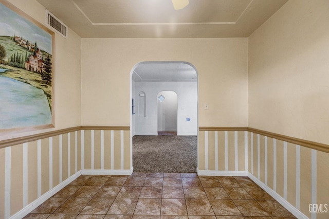 corridor with tile patterned flooring