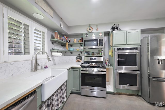 6513 Desmond Ct, Bakersfield, CA 93308 - kitchen with stainless steel appliances, light countertops, and open shelves