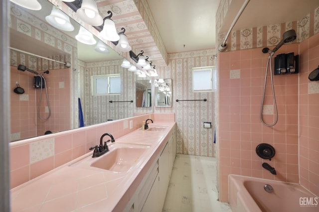 6513 Desmond Ct, Bakersfield, CA 93308 - bathroom featuring wallpapered walls, washtub / shower combination, and double vanity