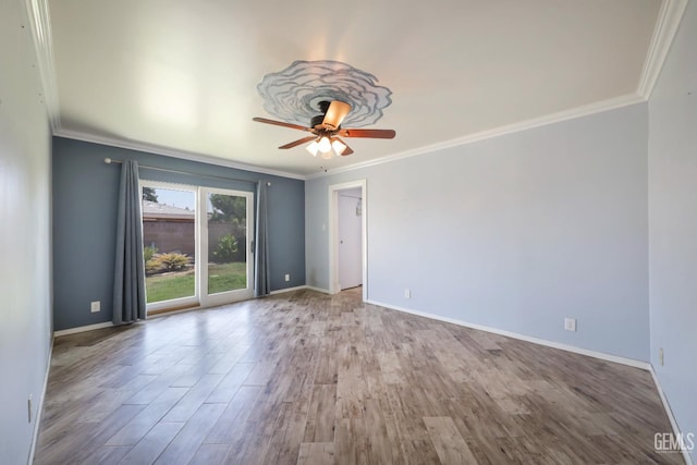 6513 Desmond Ct, Bakersfield, CA 93308 - empty room featuring wood finished floors, ceiling fan, and crown molding