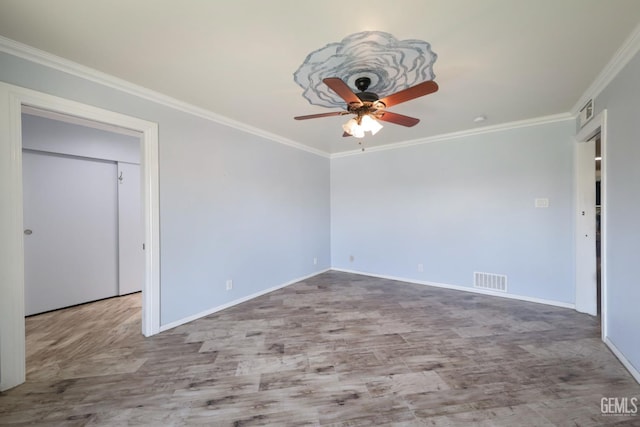 6513 Desmond Ct, Bakersfield, CA 93308 - unfurnished room with ceiling fan, wood finished floors, and ornamental molding